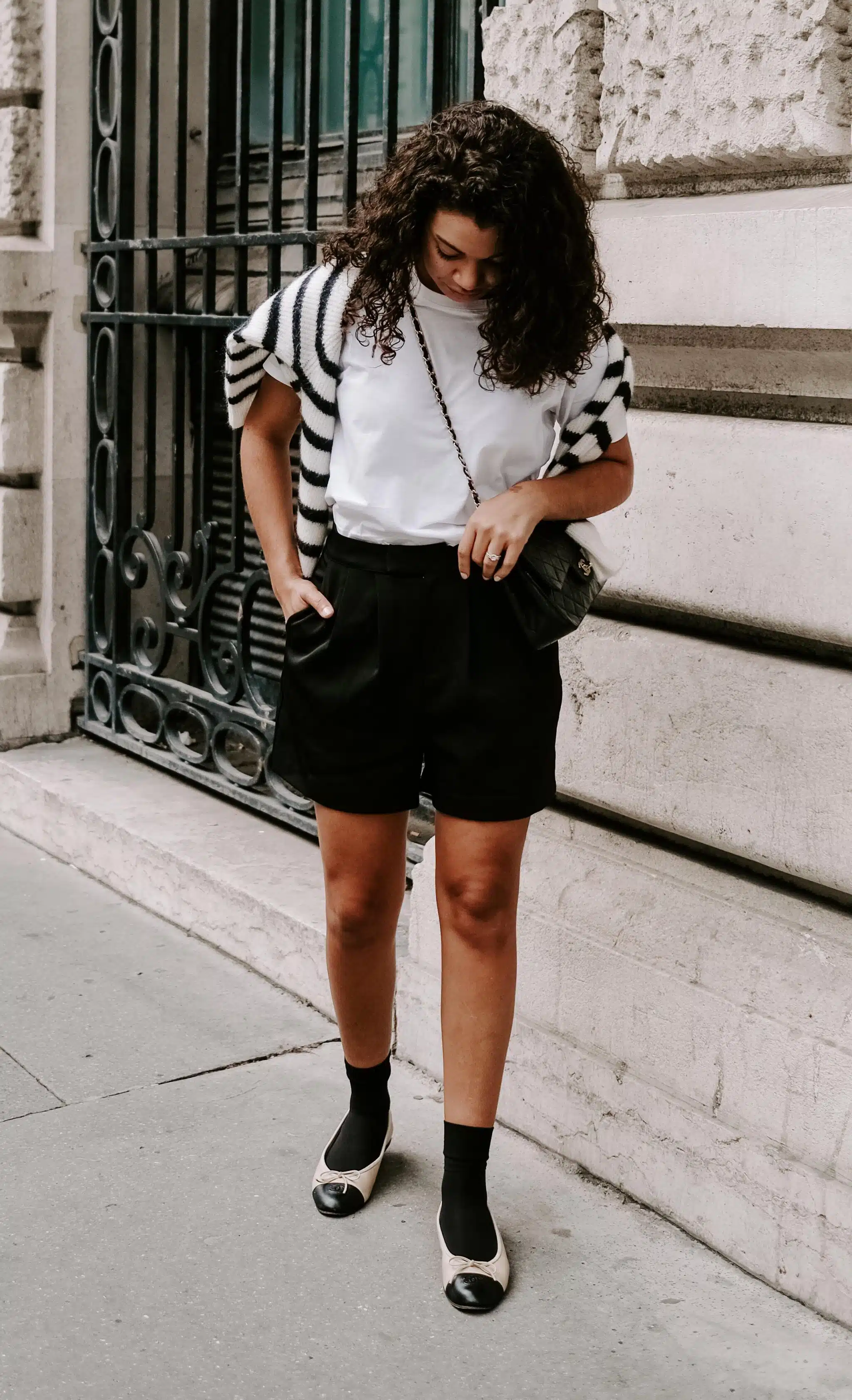 chic girl outfits, black shorts, chanel ballet flats, white t-shirt, striped sweater
