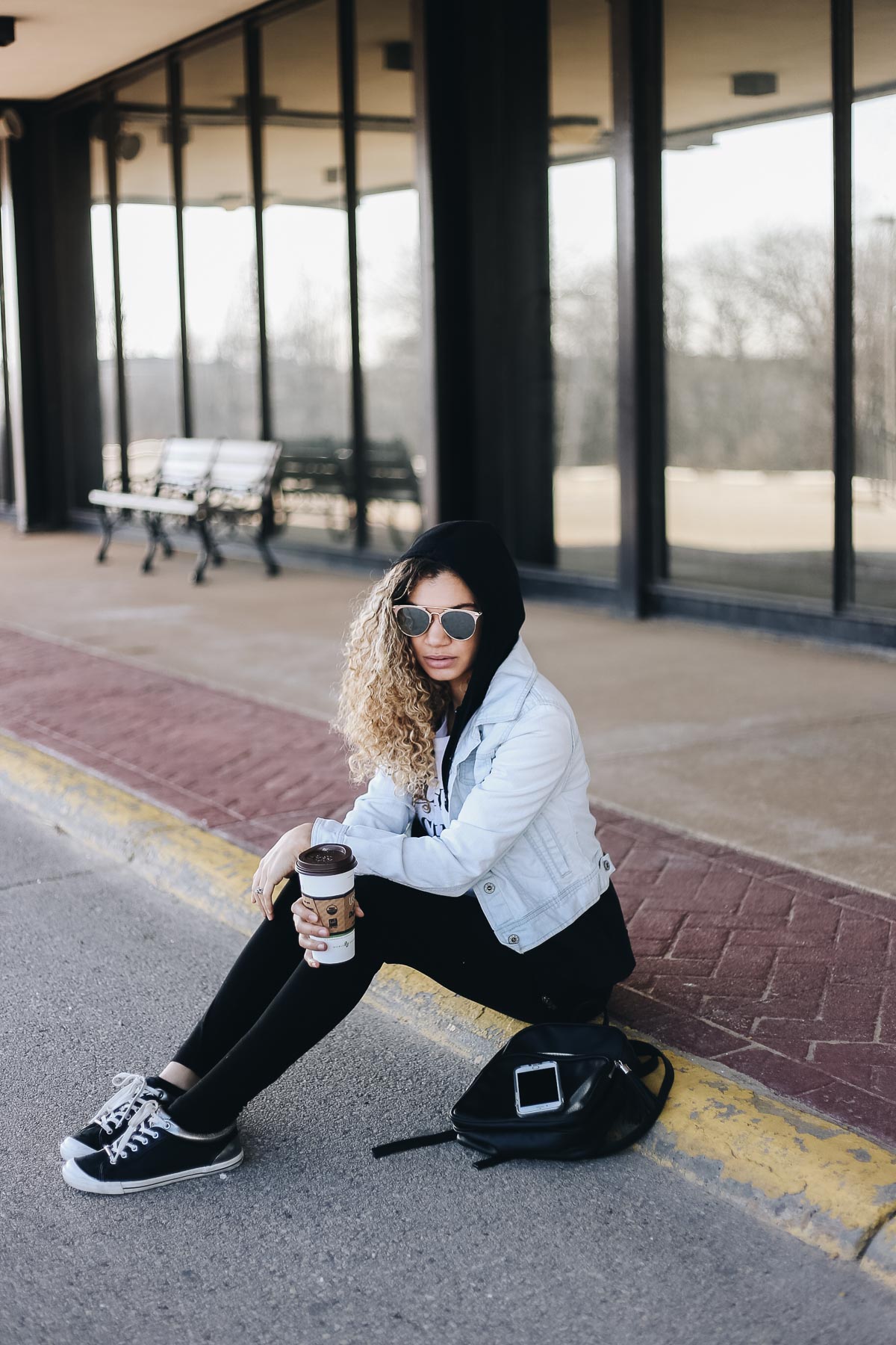 comfy airport outfit with leggings and a jean jacket