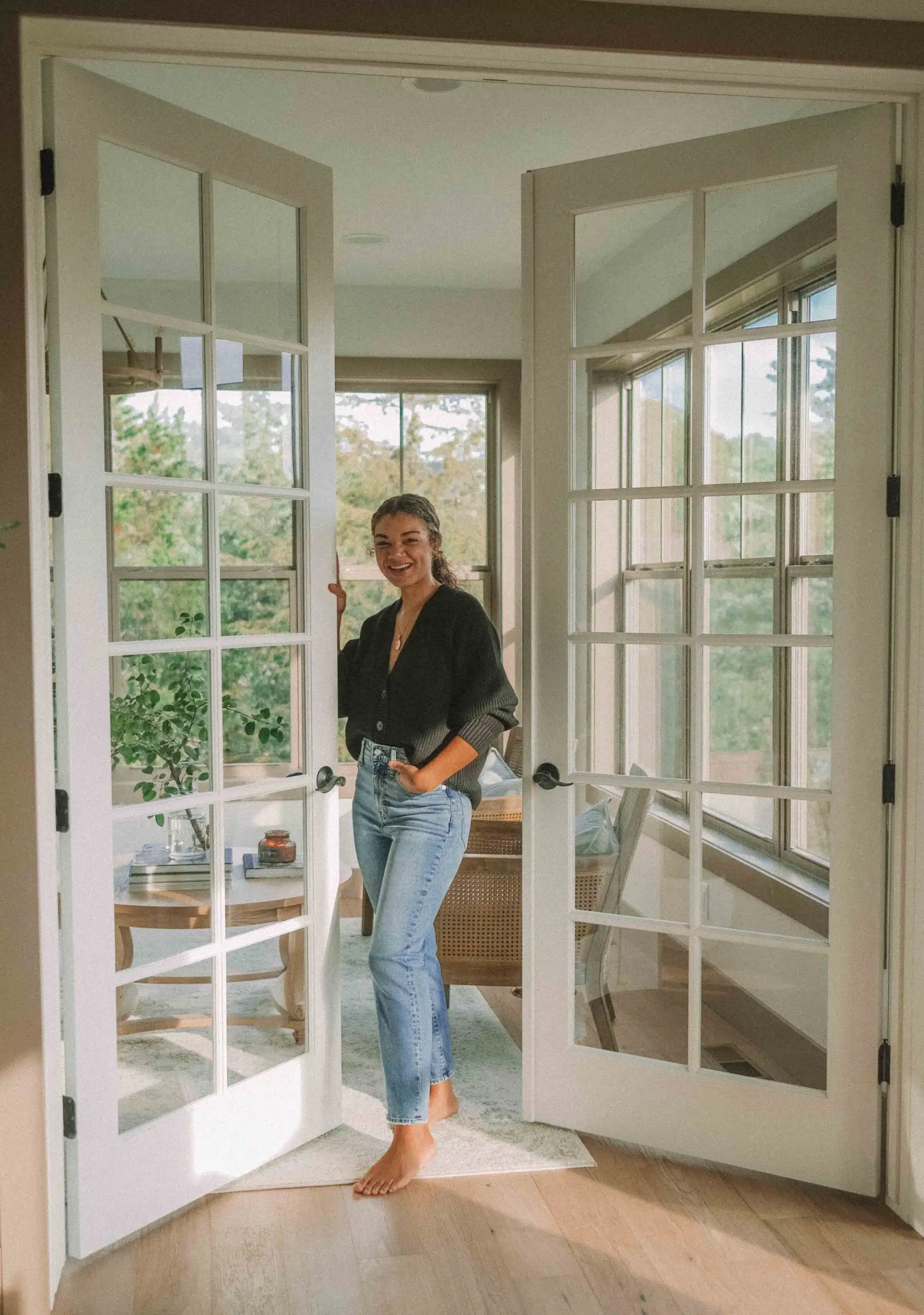 french doors leading to a library and sunroom combo