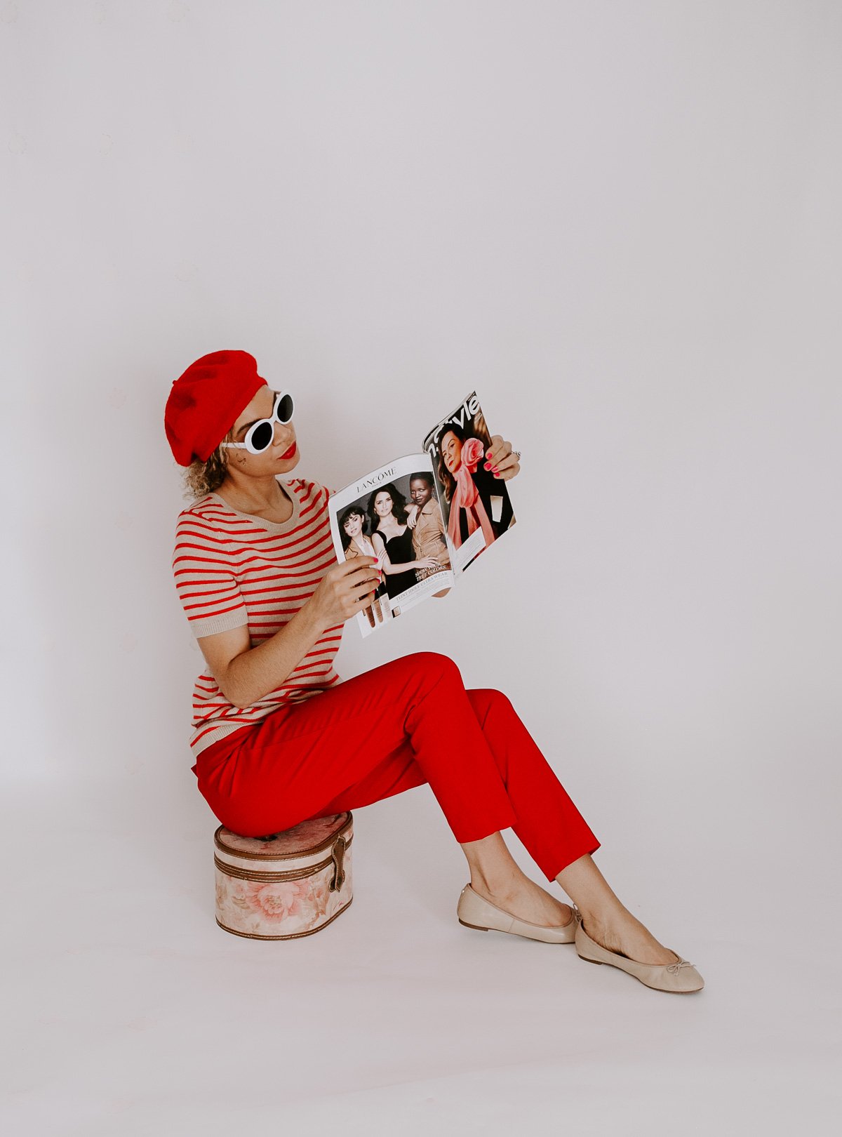 This red Parisian chic outfit with the striped top and beret is what all French style outfit dreams are made of!