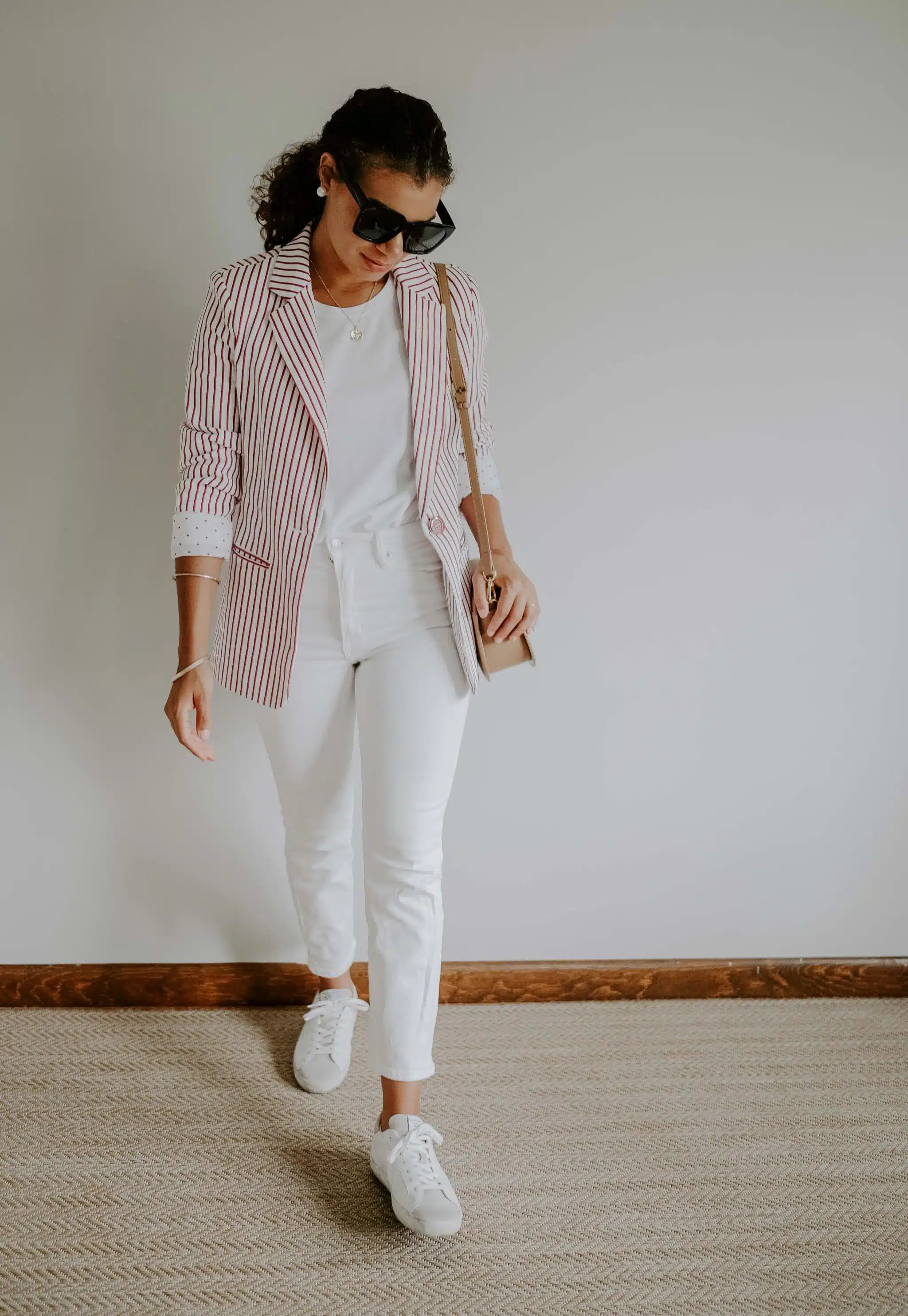striped blazer and white jeans outfit