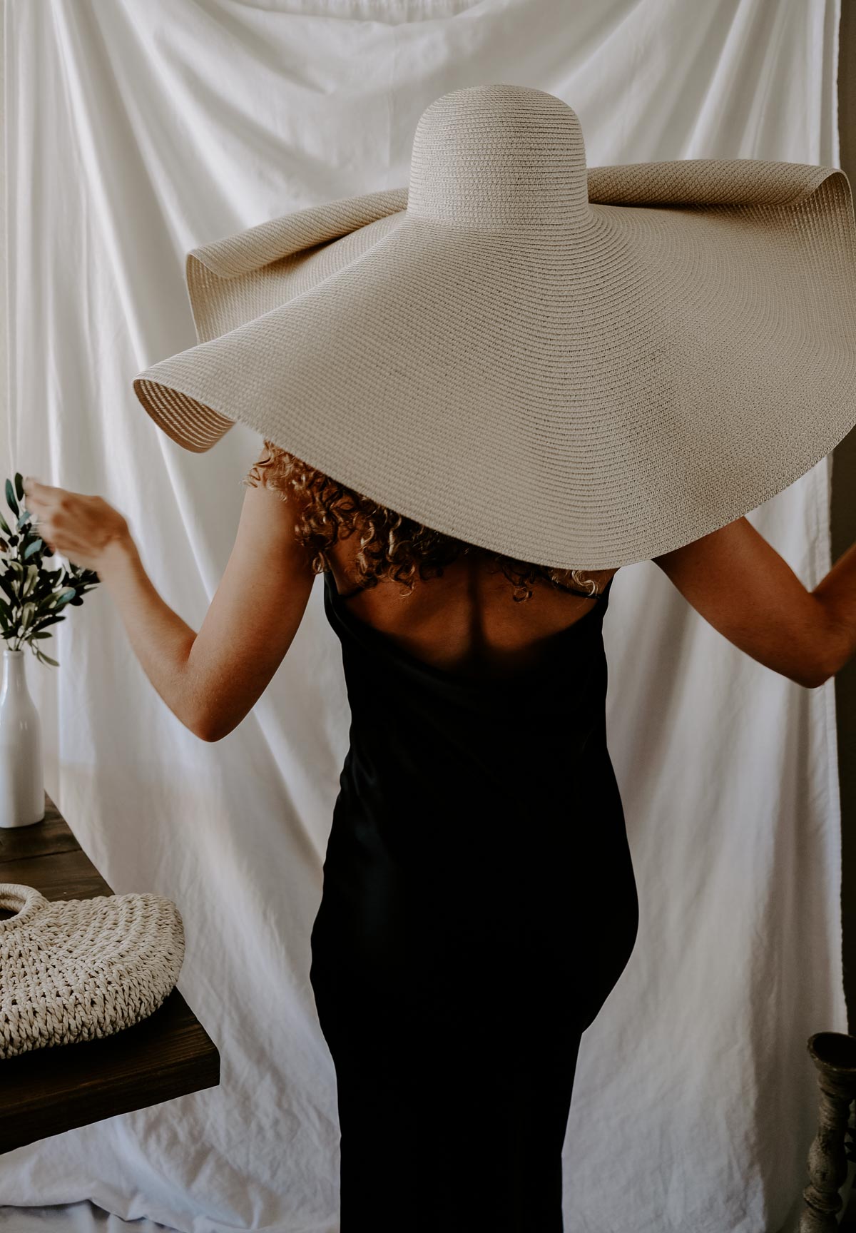 This slip dress outfit paired with this straw hat is the perfect summer outfit for vacation or any beach place!