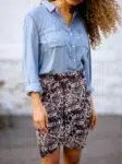 denim shirt and snakeskin skirt outfit