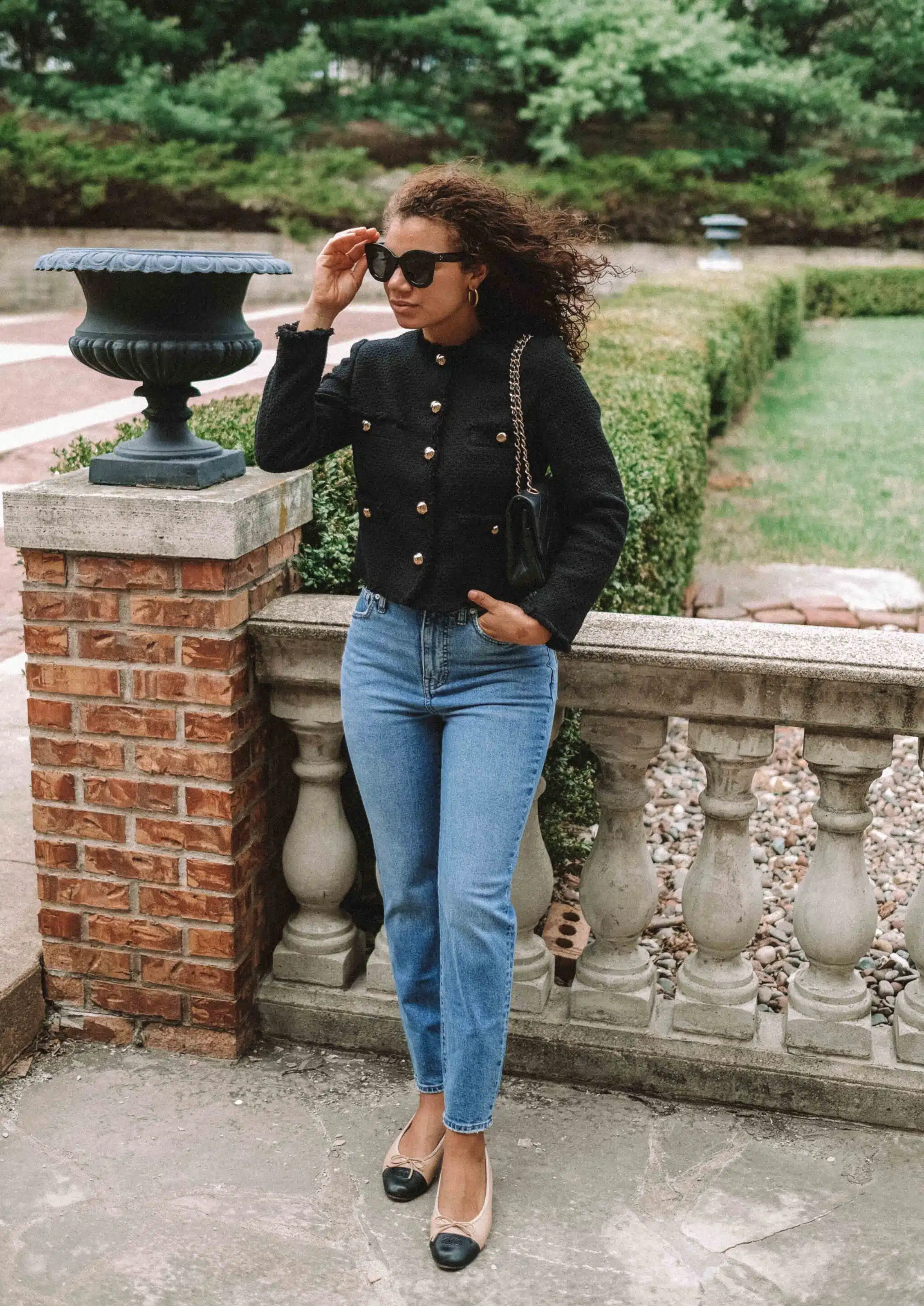 black tweed lady jacket and jeans